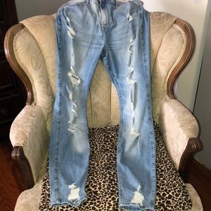 i am selling ripped light wash blue jeans
